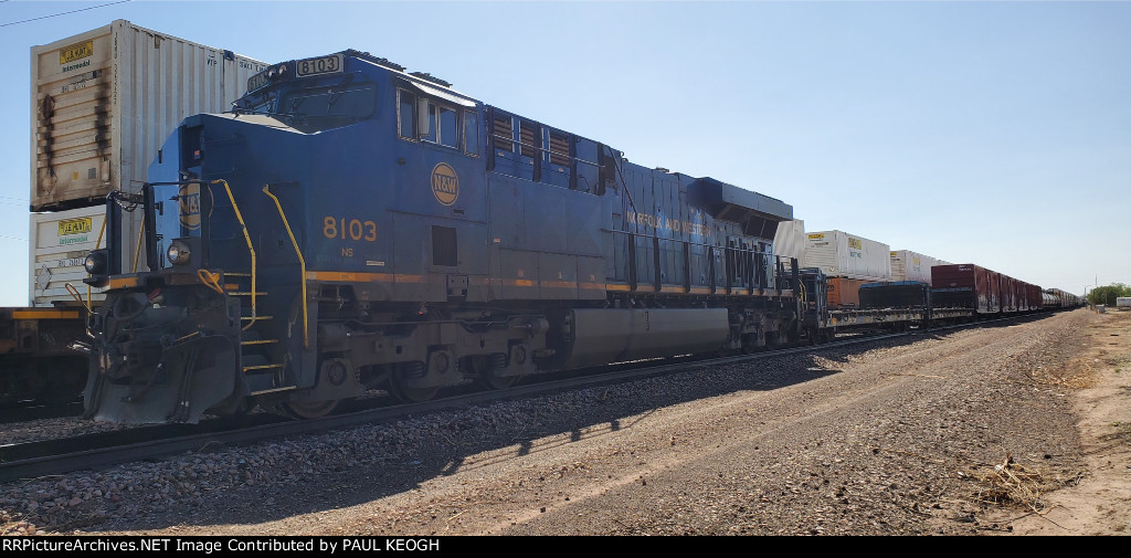 NS 8103 A Norfolk Southern Heritage ES44AC sits in the siding at BNSF Amarillo. 